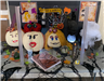 Pumpkins decorated as the witches from Hocus Pocus with crystal ball, cauldron and similar items