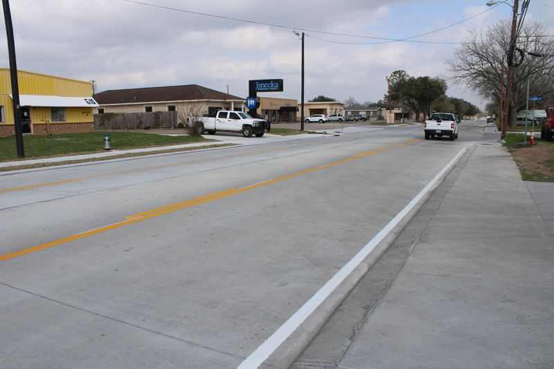 Newly paved concrete Crestwood Drive between Navarro and Laurent