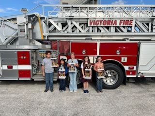 The winners of the Fire Prevention Week poster contest hosted by the Victoria Fire Department