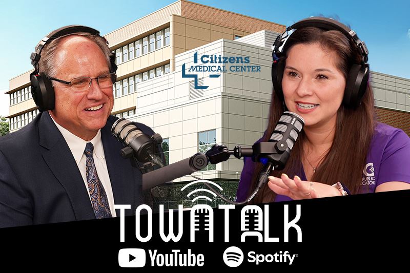 Ashley Strevel and Citizens CEO Mike Olson with a Citizens Medical Center background.