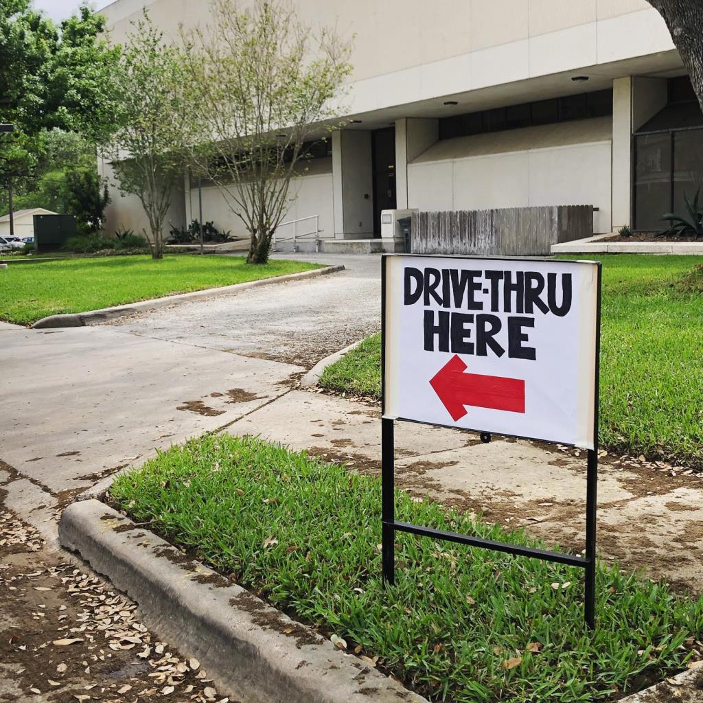 Library drive-thru sign that reads 