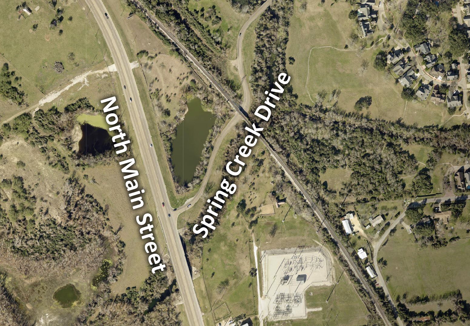 A map showing Main Street with a three-way intersection with Spring Creek Drive to the east