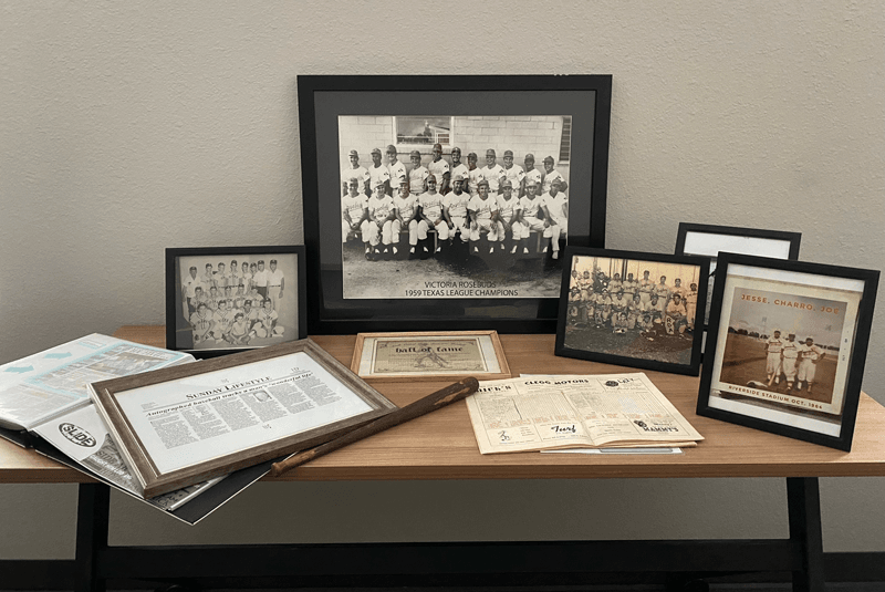 Collection of black-and-white baseball photos and other memorabilia