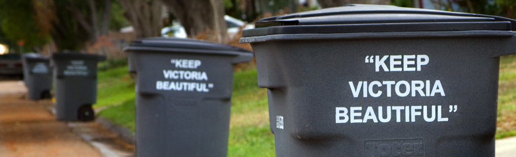 Trash bins with Keep Victoria Beautiful written on them