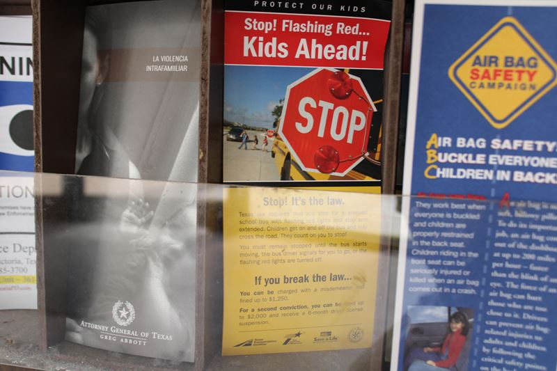 Flyers with information about child safety, traffic safety and family violence