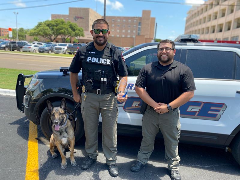 Two police officers and a K9