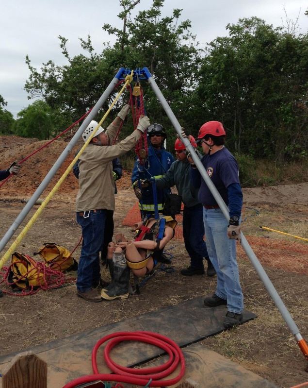 Four Fire Department Members participate in a Confined Space Rescue Training Drill