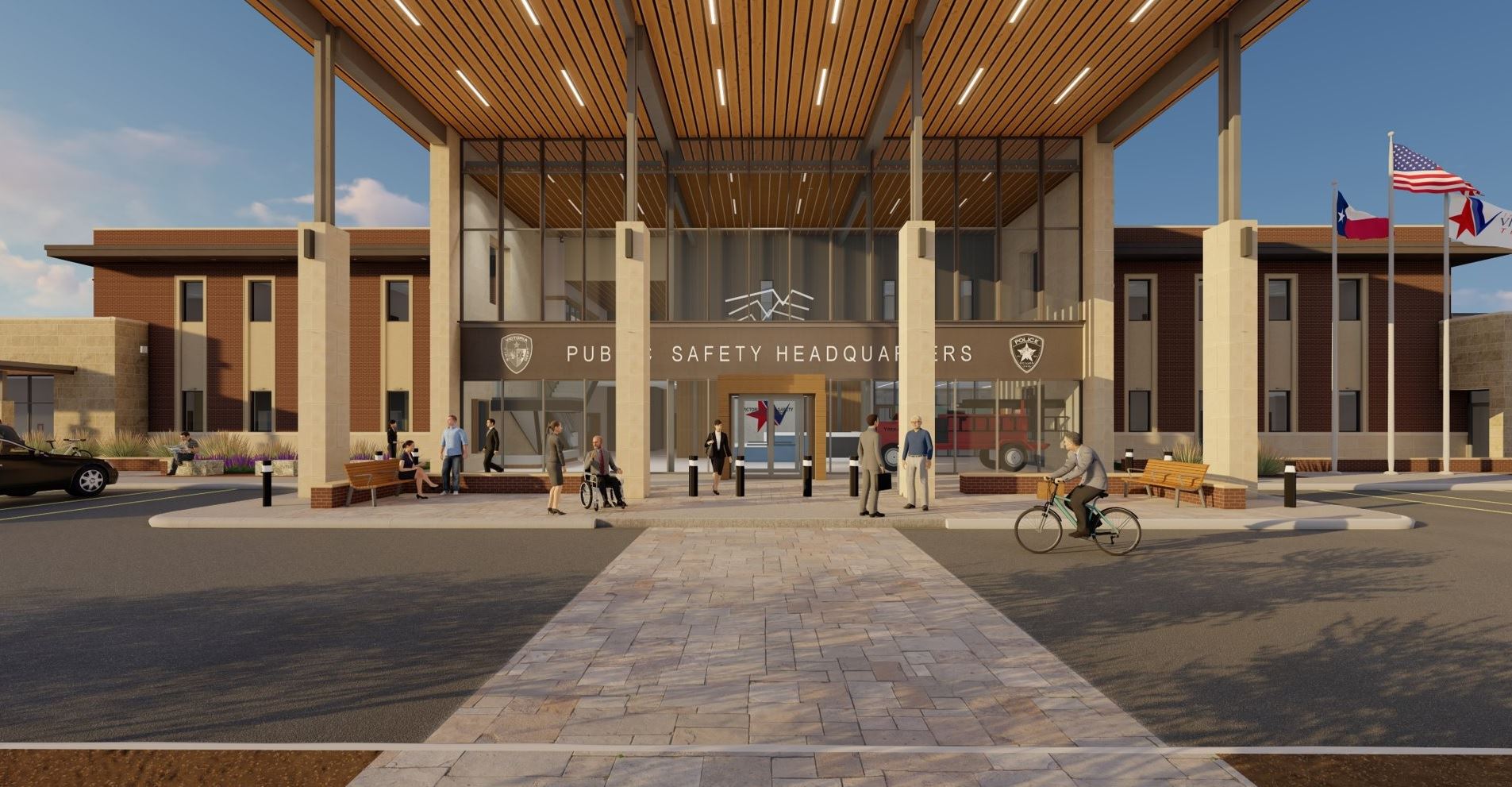 Large, two-story building with police and fire logos and the words Public Safety Headquarters