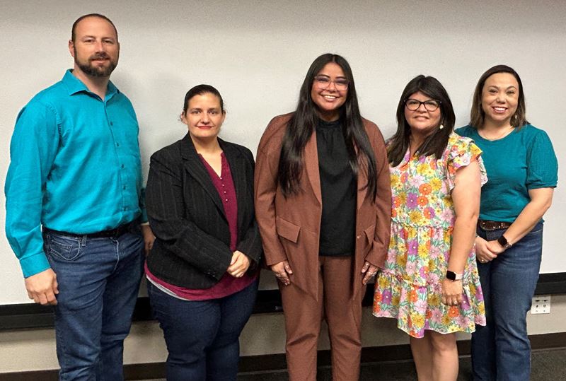Group photo in City of Victoria conference room.