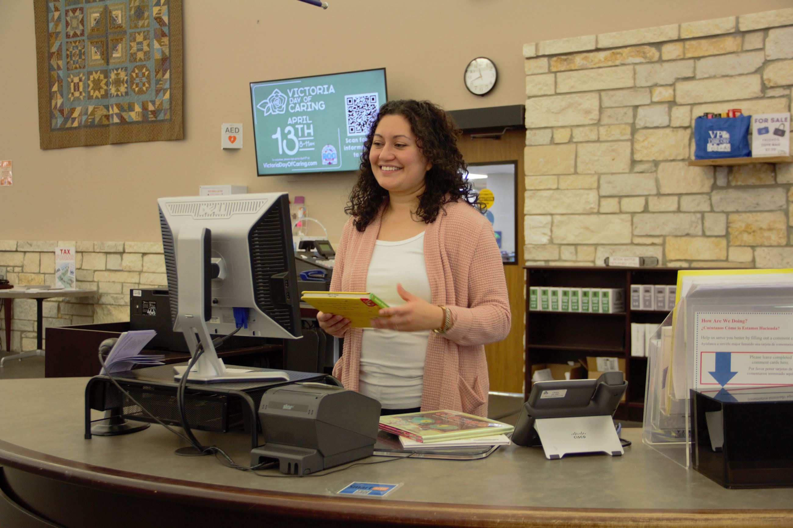 Staff working at the service desk